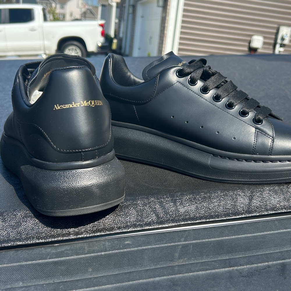 Alexander McQueen Black Leather Oversized Sneakers with Gold Logo